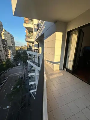 a balcony of a building with a view of a street at Estrada Apart in Cordoba