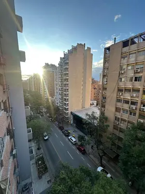 a view of a street in a city with buildings at Estrada Apart in Cordoba