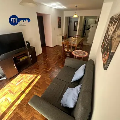 a living room with a couch and a television at Estrada Apart in Cordoba