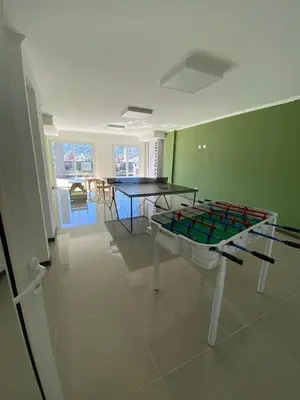 a room with a table and a dining room at Departamento Venetto 8 in Villa Carlos Paz