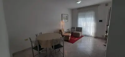 a dining room with a table and chairs in a room at 1º A y 2º A in Cordoba