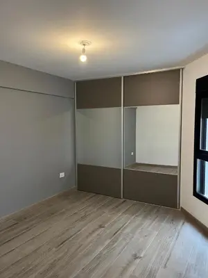 an empty room with shelves and a window at DEPARTAMENTO TEMPORARIO UNICO CON SEGURIDAD 24 HS EN LA MEJOR ZONA NvA CORDOBA in Cordoba