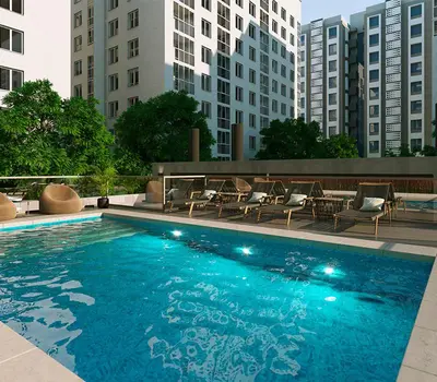 a large blue swimming pool in a city with buildings at DEPARTAMENTO TEMPORARIO UNICO CON SEGURIDAD 24 HS EN LA MEJOR ZONA NvA CORDOBA in Cordoba