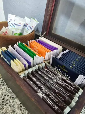 a display ofcolored books in a wooden box at Departamento Córdoba Semipiso frente a Patio Olmos in Cordoba