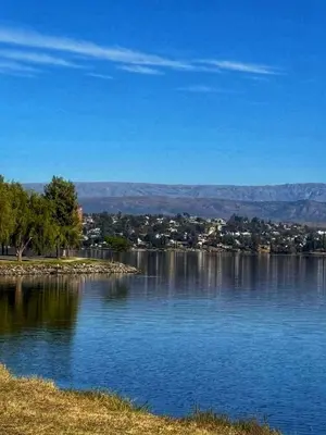 a view of a large body of water at Cómoda y Espaciosa Casa Céntrica Frente al Lago San Roque - Carlos Paz in Villa Carlos Paz