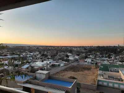 a view of a city at sunset at Terra Zión in Cordoba