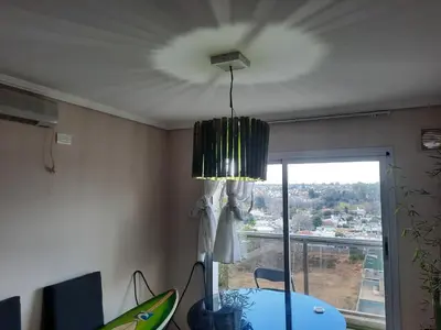 a chandelier hanging from a ceiling in a room at Terra Zión in Cordoba