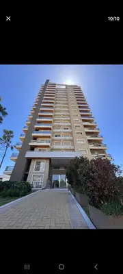 a large apartment building with a walkway in front of it at Terra Zión in Cordoba