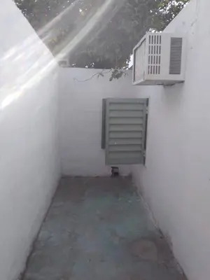 a room with a air conditioner on a white wall at Departamento luna in Cordoba