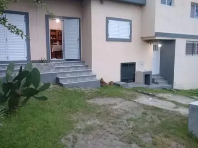 a house with a plant in the front yard at Mafalda in Tanti