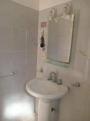 a bathroom with a sink and a mirror at Mafalda in Tanti