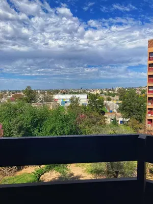 a view of a city from a window at Departamento Juniors in Cordoba