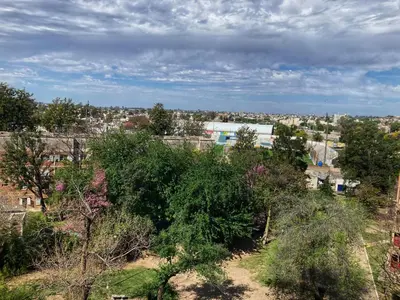 an overhead view of a city with trees and buildings at Departamento Juniors in Cordoba