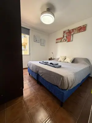 a bedroom with a bed in a room at Apartmento completo en Nueva Córdoba Argentina in Cordoba