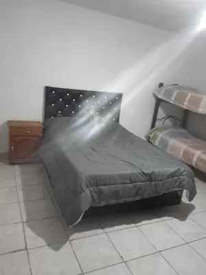 a bedroom with a bed with a star pattern on the wall at El portal in Cordoba