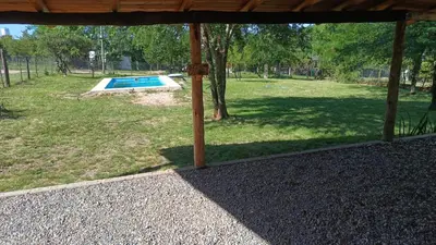 a view of a yard with a swimming pool at La Rufina Casa De Campo in Potrero de Garay
