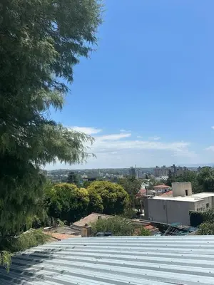 a view from the top of the roof of a building at Carlos Paz Hostel Lodge in Villa Carlos Paz