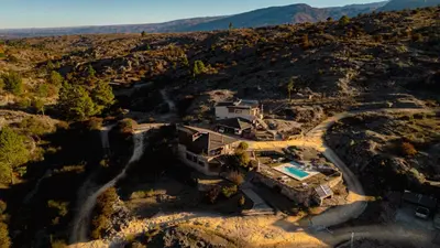 an aerial view of a house on a mountain at Cuesta de las Piedras in La Cumbrecita