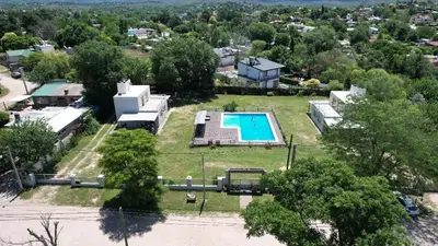 an aerial view of an estate with a swimming pool at Cabañas Las Luceros in San Antonio de Arredondo