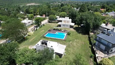 an aerial view of a house with a swimming pool at Cabañas Las Luceros in San Antonio de Arredondo