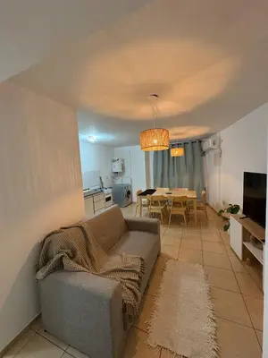 a living room with a couch and a table at Departamento Excelente Ubicación ! in Cordoba