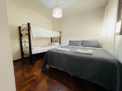 a bedroom with a bed with two towels on it at Apartment in Nueva Córdoba in Cordoba