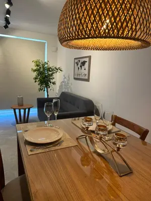 a dining room table with wine glasses on it at A estrenar!! Nordic Chic in Cordoba