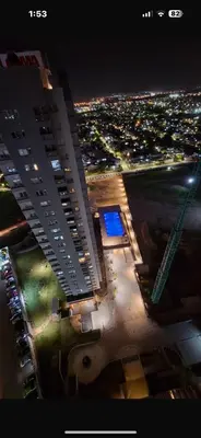 an overhead view of a city at night with a building at A estrenar!! Nordic Chic in Cordoba