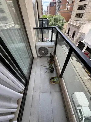 a balcony of a building with a view of a street at Buena vista in Cordoba