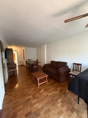 a living room with a couch and a table at ituzaingo house in Cordoba