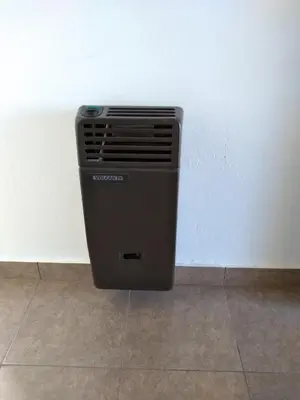 a trash can sitting next to a wall at Departamento Loma Hermosa in Santa Rosa de Calamuchita