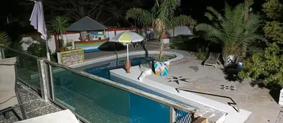 an overhead view of a swimming pool at night at Casas y Chalets Privados Valle del Reposo in Bialet Massé