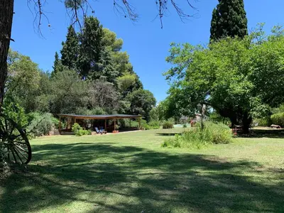 a garden with a pavilion in the middle of a park at Casa de campo La Añurita in San Javier