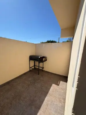 a piano sitting in the corner of a wall at Depto Quality in Cordoba