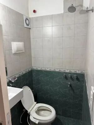 a bathroom with a toilet and a shower at Depto Quality in Cordoba