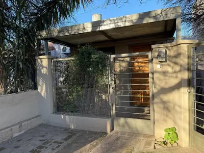 a gate to a house with a fence at Stanza Córdoba, Heriberto Martinez, Villa Belgrano in Cordoba