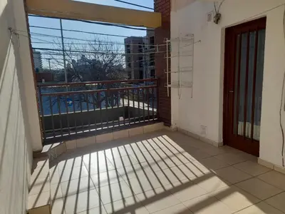 an empty balcony with a view of a building at Apartamento LEO-BEL in Cordoba