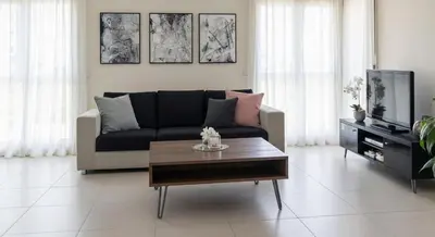 a living room with a couch and a coffee table at Depto cómodo en Nueva Córdoba in Cordoba