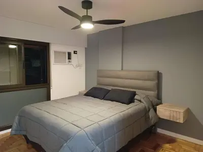 a bedroom with a bed and a ceiling fan at Spectacular location close to Buen Pastor in Cordoba