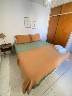 a bedroom with a bed in a room at EfeCalm Entre Ríos in Cordoba