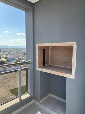 a room with a window with a view of a city at Cuidad Gama Luxury - 2 Dormitorios in Cordoba