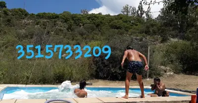 a group of people in a swimming pool at Lo de Antó in Cavalango