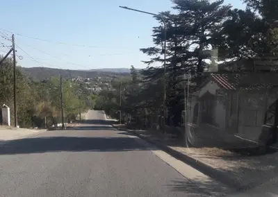 an empty street with a house on the side of the road at Lo de Antó in Cavalango