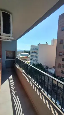 a balcony with a view of a city at Habitana Firpo Cofico con cochera in Cordoba