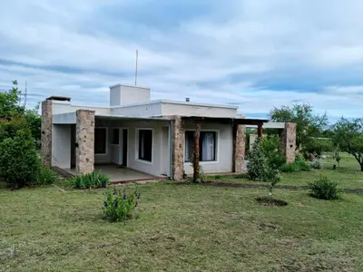 a house that is sitting in a field at Finca La Hermosa in San Javier