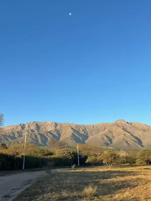 a dirt road with mountains in the background at Finca La Hermosa in San Javier