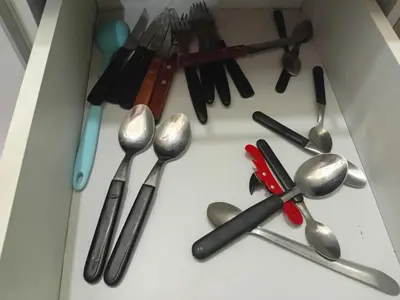 a group of utensils sitting on top of a table at Alquimia Dos in Cordoba
