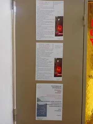 a door with some papers on the wall at Alquimia Dos in Cordoba