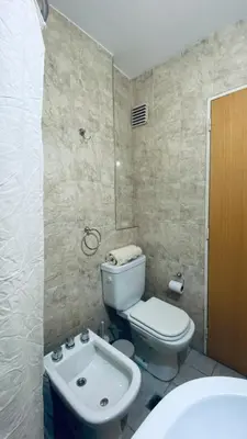 a bathroom with a toilet and a sink at Urban 362 in Cordoba