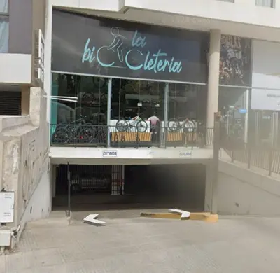 a store front of a building with a sign on it at Depto en pleno centro Villa Carlos Paz in Villa Carlos Paz